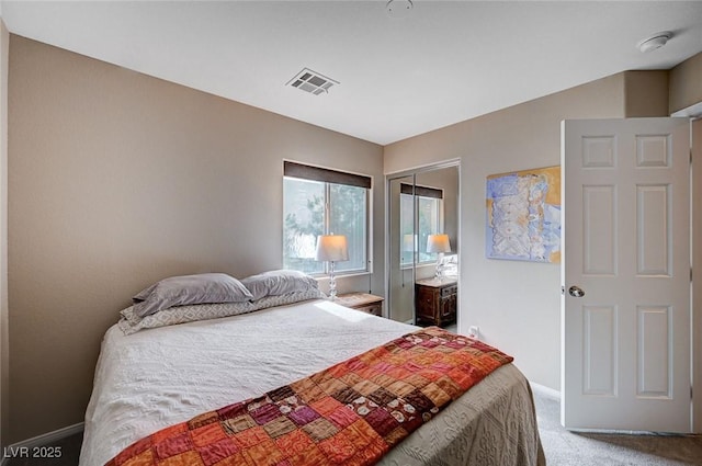 11092 Abbeyfield Rose Dr, Henderson, NV 89052 - carpeted bedroom featuring a closet, baseboards, and visible vents