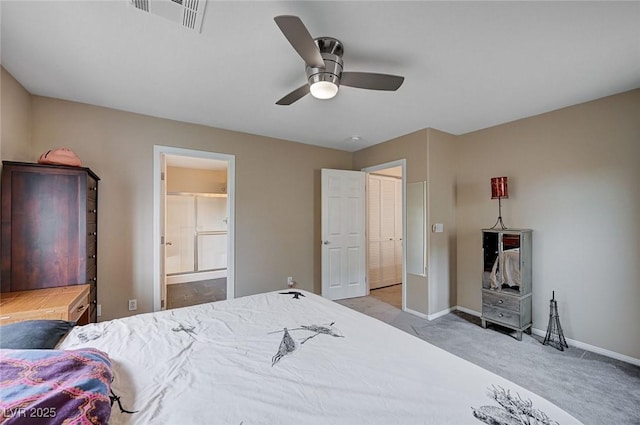 bedroom with visible vents, connected bathroom, carpet floors, baseboards, and ceiling fan