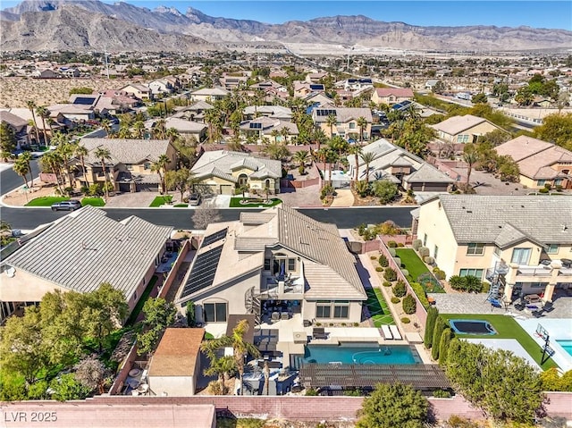 bird's eye view with a residential view and a mountain view