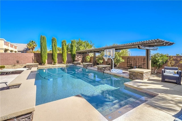 view of pool with a patio area and a fenced backyard