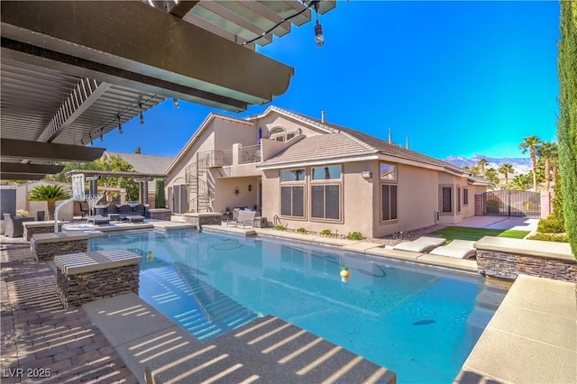 outdoor pool featuring a gate, stairway, a pergola, and a patio area