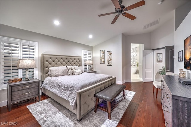 bedroom with visible vents, dark wood-style floors, recessed lighting, baseboards, and vaulted ceiling