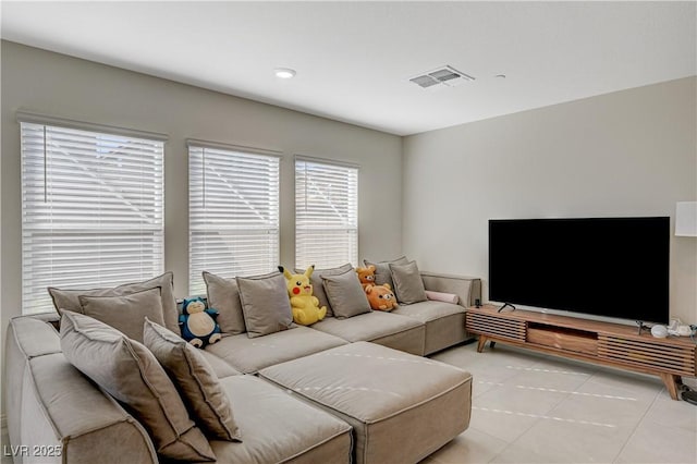 5691 Tinar St, Las Vegas, NV 89113 - living area with plenty of natural light, light tile patterned floors, and recessed lighting