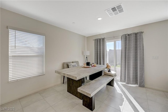5691 Tinar St, Las Vegas, NV 89113 - dining area with baseboards, light tile patterned flooring, and recessed lighting