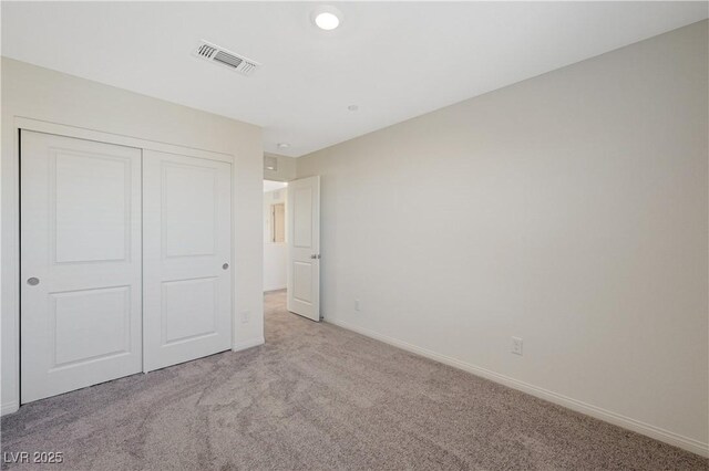 5691 Tinar St, Las Vegas, NV 89113 - unfurnished bedroom featuring carpet flooring, baseboards, and a closet
