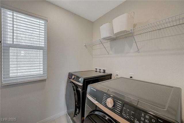 5691 Tinar St, Las Vegas, NV 89113 - washroom with washing machine and clothes dryer and baseboards