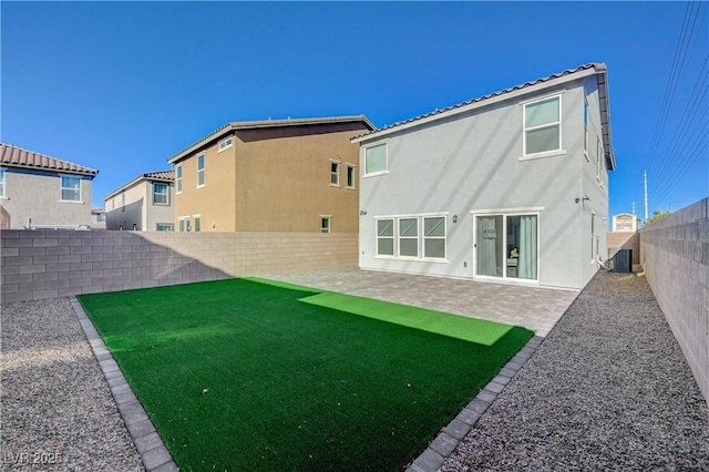 5691 Tinar St, Las Vegas, NV 89113 - back of house with central AC, stucco siding, and a patio area