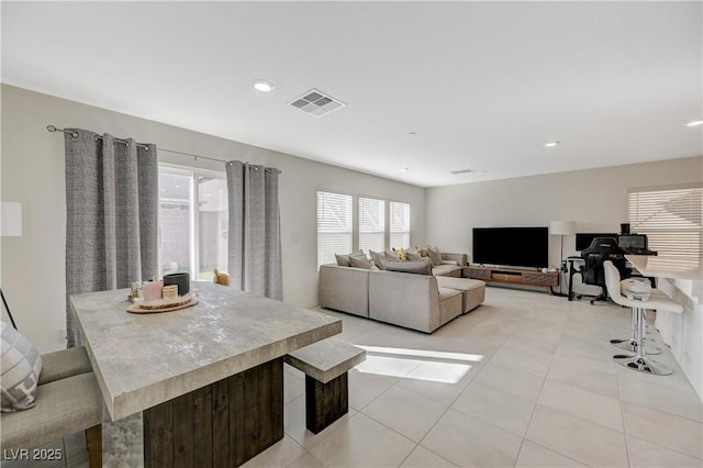 5691 Tinar St, Las Vegas, NV 89113 - living area featuring light tile patterned floors and recessed lighting