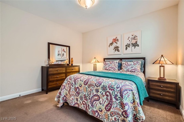 carpeted bedroom with baseboards