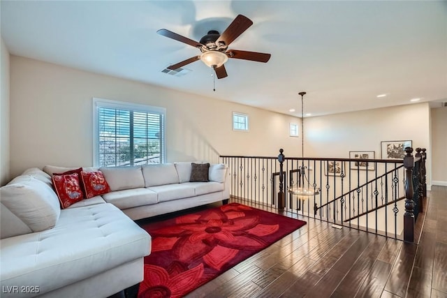 living area featuring recessed lighting, wood finished floors, visible vents, and ceiling fan