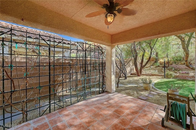 view of patio featuring a ceiling fan