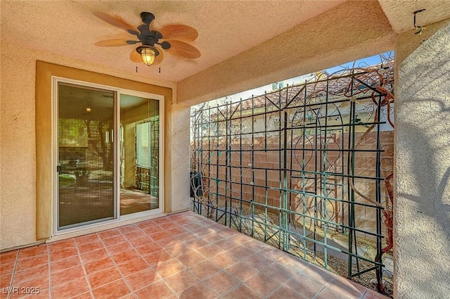 view of patio featuring a ceiling fan