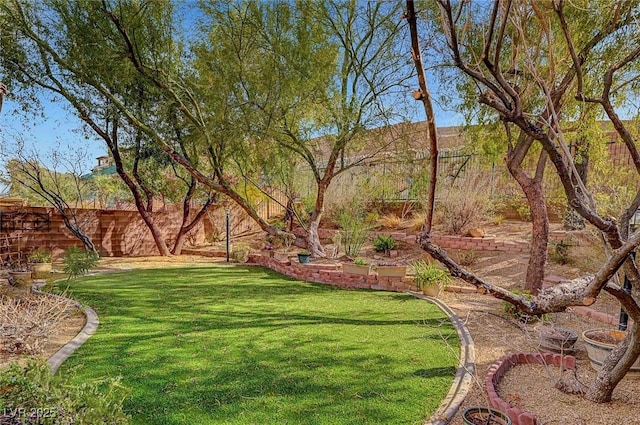 view of yard featuring fence