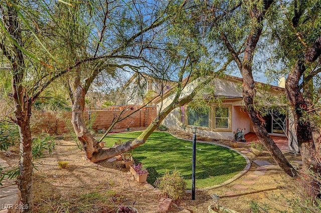 view of yard with fence