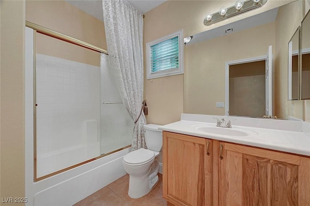 bathroom featuring vanity, visible vents, tile patterned floors, toilet, and shower / tub combo with curtain