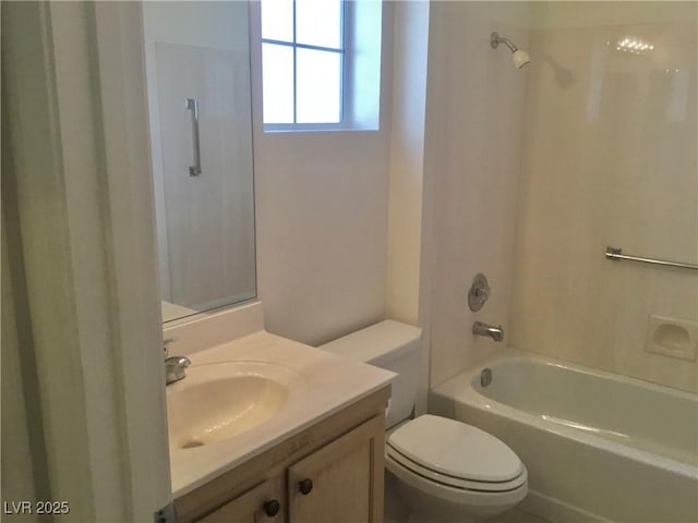 full bathroom featuring toilet, bathtub / shower combination, and vanity