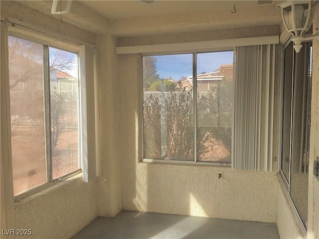 view of unfurnished sunroom