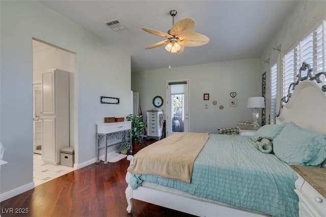 bedroom featuring visible vents, baseboards, wood finished floors, and a ceiling fan