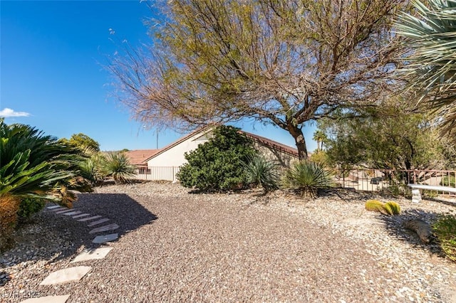 view of yard with fence