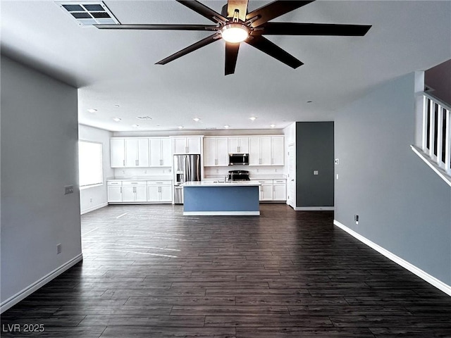 unfurnished living room featuring dark wood-style flooring, baseboards, a ceiling fan, and recessed lighting