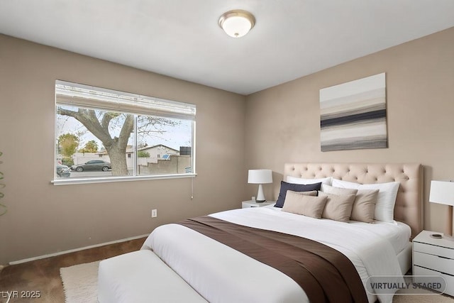 bedroom featuring baseboards