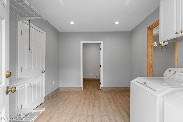 laundry room with recessed lighting, baseboards, cabinet space, and light wood finished floors