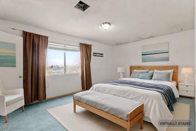 bedroom with carpet flooring and baseboards