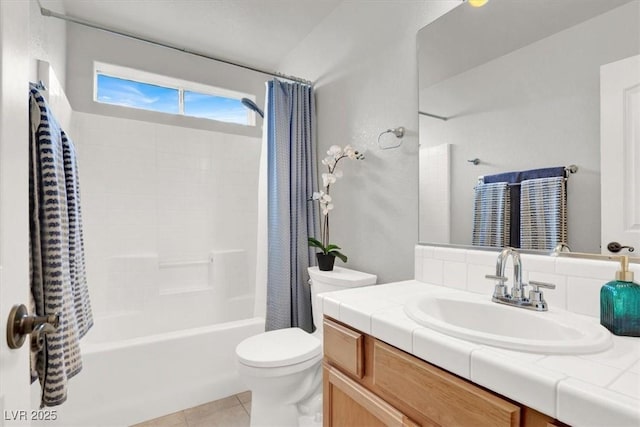 bathroom with tile patterned floors, vanity, toilet, and shower / tub combo with curtain