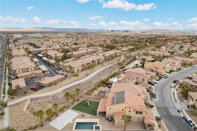 birds eye view of property featuring a residential view and a mountain view