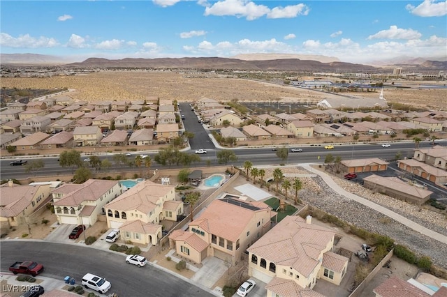 aerial view featuring a mountain view and a residential view