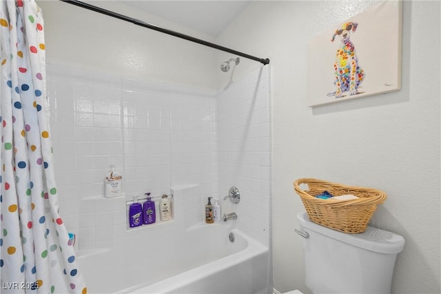 bathroom featuring toilet and shower / bath combo with shower curtain