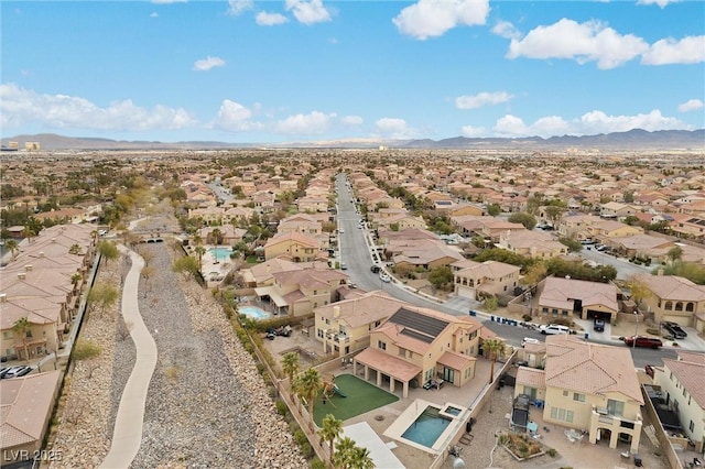 aerial view with a mountain view and a residential view