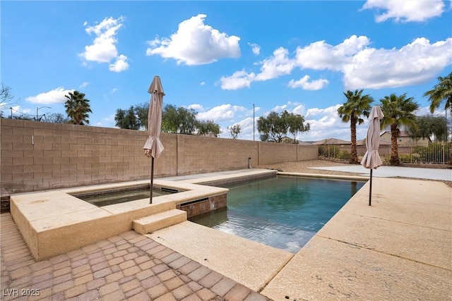 view of pool with a fenced in pool, a patio, an in ground hot tub, and a fenced backyard