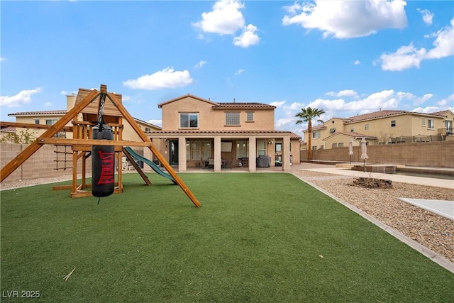 exterior space with a yard, a patio area, and a fenced backyard