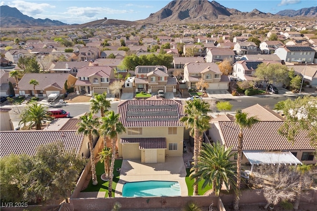 drone / aerial view with a mountain view and a residential view