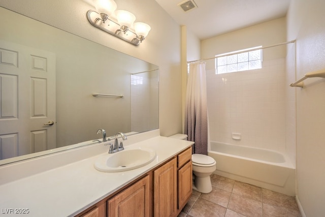 full bath with vanity, visible vents, tile patterned flooring, shower / bath combination with curtain, and toilet