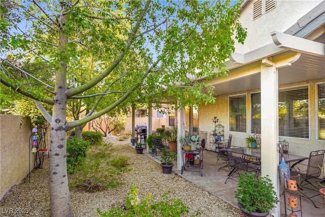7172 Painted Paradise St, Las Vegas, NV 89131 - view of yard with a patio