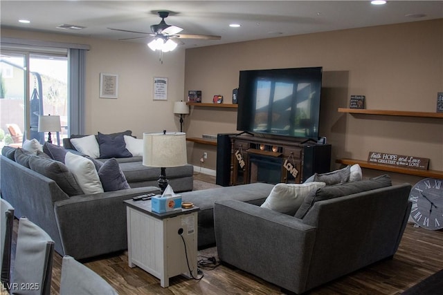 living room featuring recessed lighting, visible vents, wood finished floors, and a ceiling fan