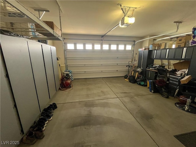 garage featuring a garage door opener