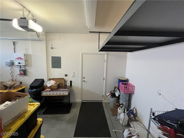 garage featuring electric panel and a garage door opener