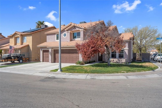 view of front of property featuring stucco siding, a front lawn, a tile roof, concrete driveway, and an attached garage