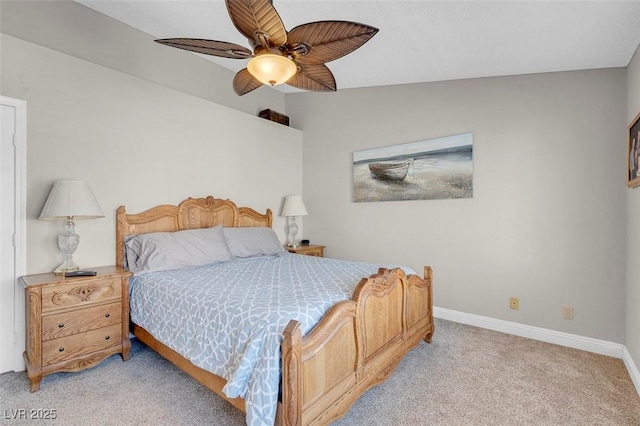 bedroom featuring a ceiling fan, lofted ceiling, light colored carpet, and baseboards