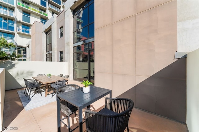 balcony with outdoor dining area