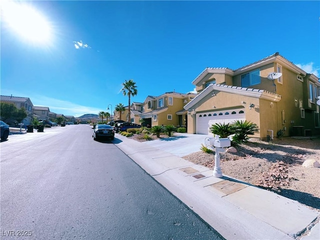 view of street featuring sidewalks and a residential view