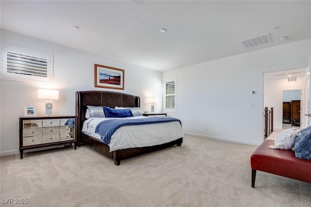bedroom featuring light colored carpet, baseboards, and visible vents
