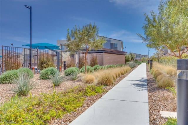 surrounding community featuring fence
