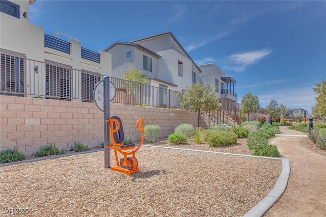 view of yard with a residential view and fence
