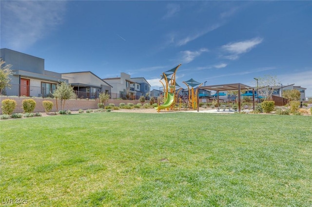 view of yard featuring playground community