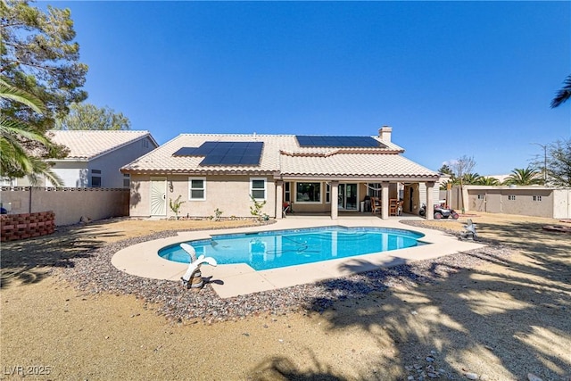 view of pool with a patio area, a fenced in pool, and a fenced backyard