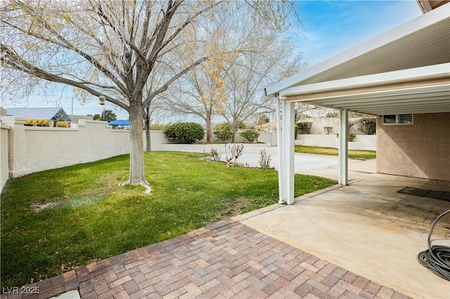 view of yard with a patio area and fence